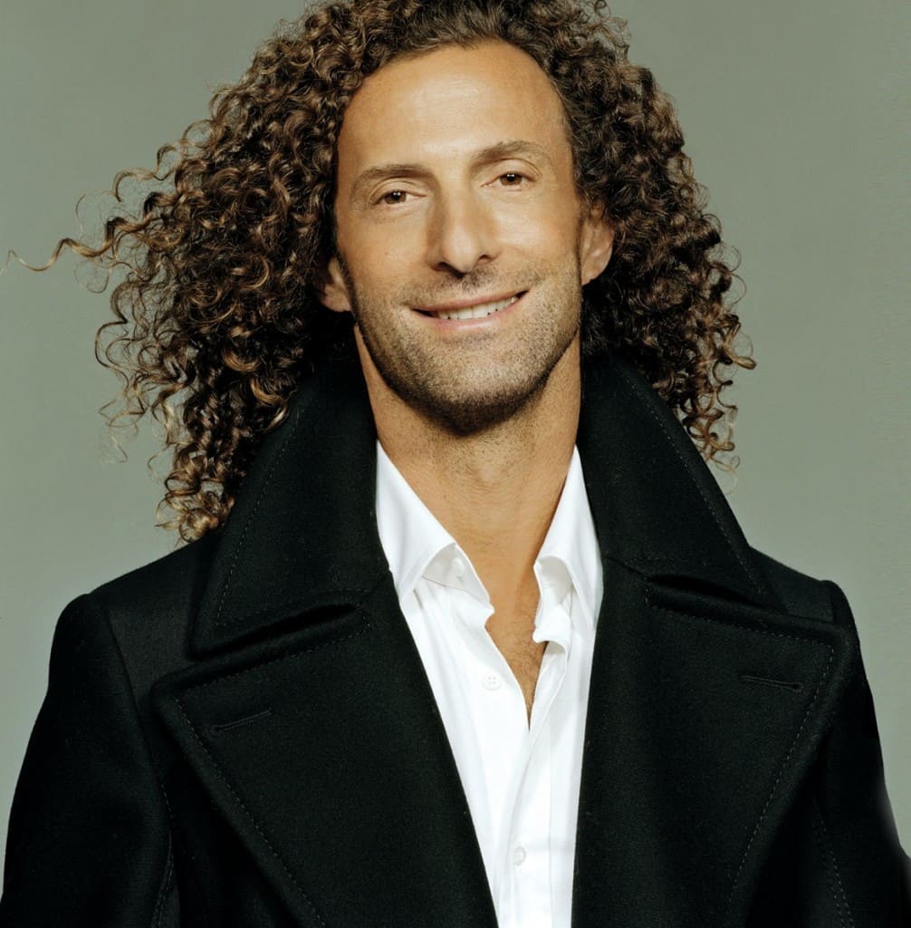 Kenny G curly men's hairstyle